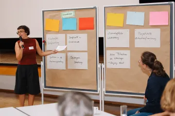 Moderatorin plant die Sessions